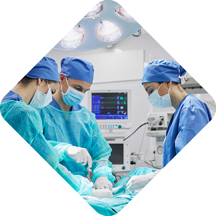 Doctors and nurses operating on a patient